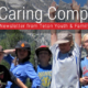 Fall_2019 newsletter featured image_kids with hand in the air in front of the Tetons