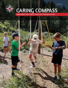 Cover of Fall 2022 newsletter - kids on rope course